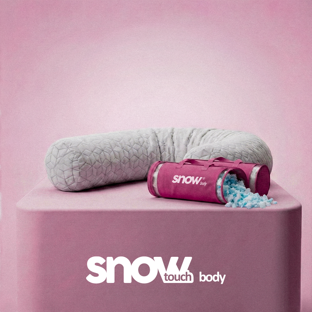 SnowTouch maternity body pillow with adjustable memory foam filling full-body support during pregnancy